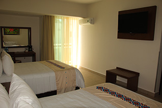 Habitación con 2 camas del hotel Tulijá Express